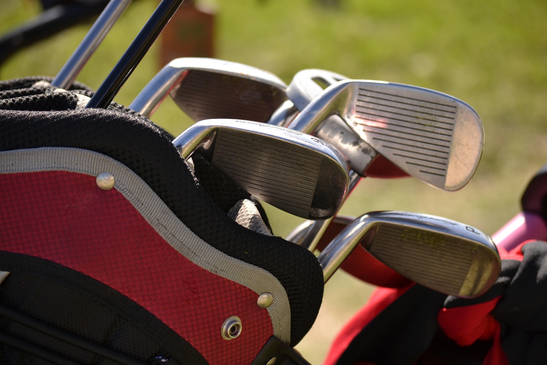 Set of Golf House irons in a golf bag